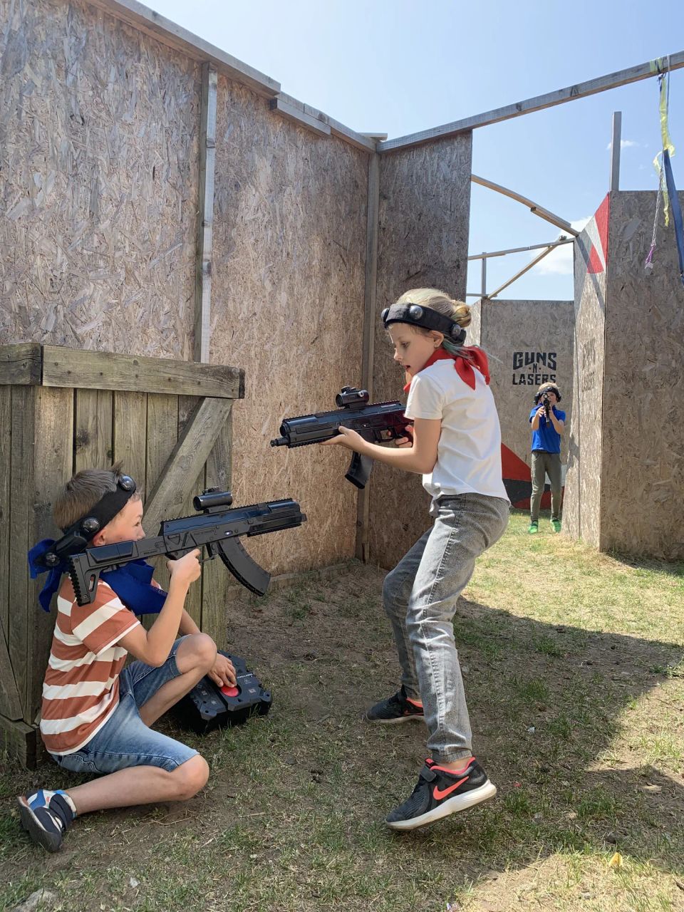 children playing laser tag or laser paintball