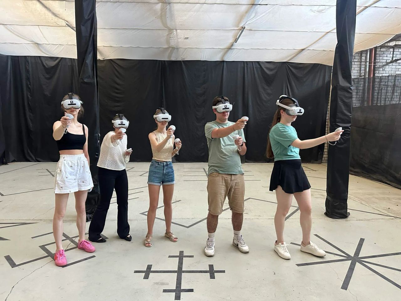 school students playing VR during a school trip