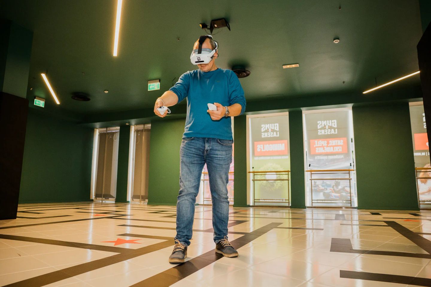 A man dives into another reality while playing free-roam VR.