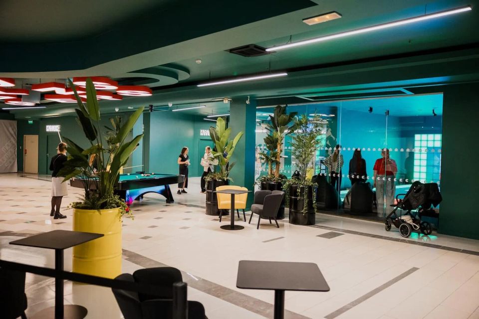 A billiard table on the entertainment park floor at Galerija Centrs