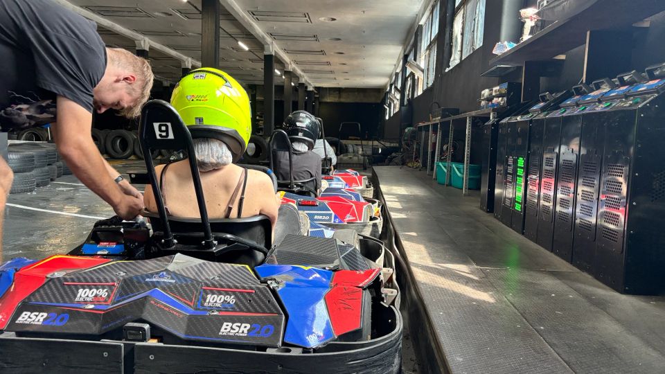 friends driving electric go-karts