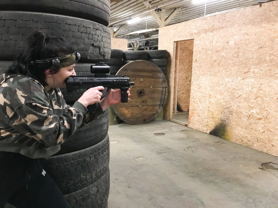 woman playing laser tag
