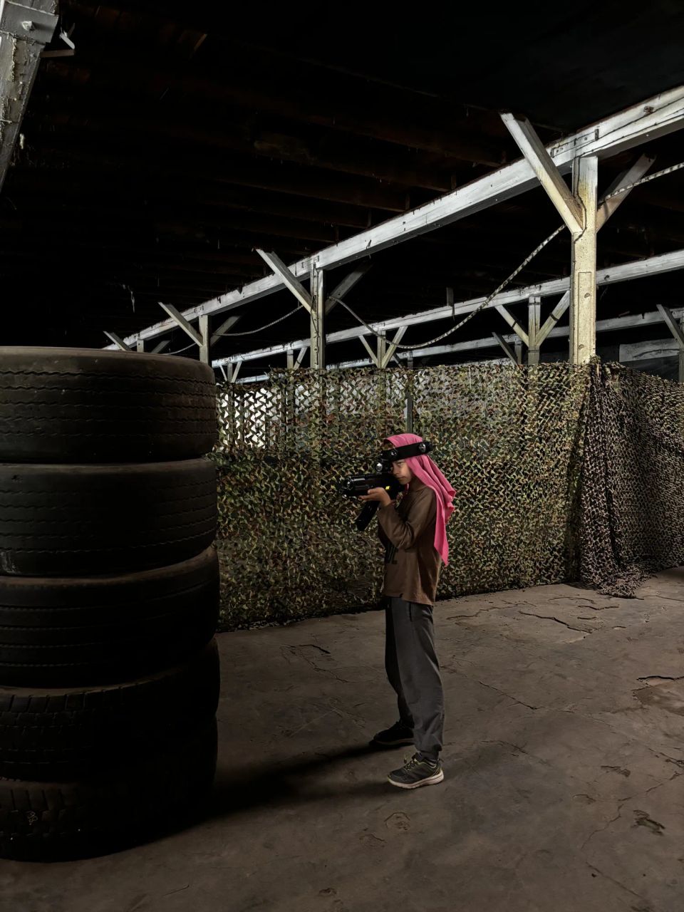 players in a laser tag and airsoft game