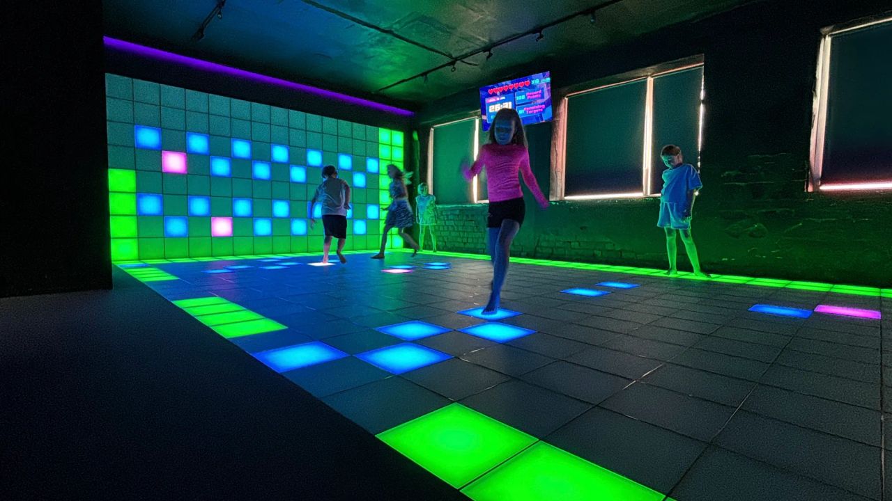 Adult birthday celebration in the Pixel Room